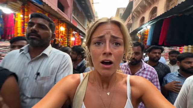 Seedance Prompt - Style: Ultra-energetic travel vlog, handheld camera, fast-pa