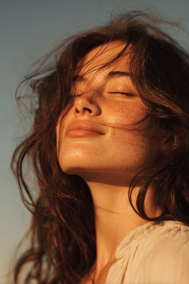 GPT Image Prompt - Ultra-realistic golden hour close-up portrait of a young wom