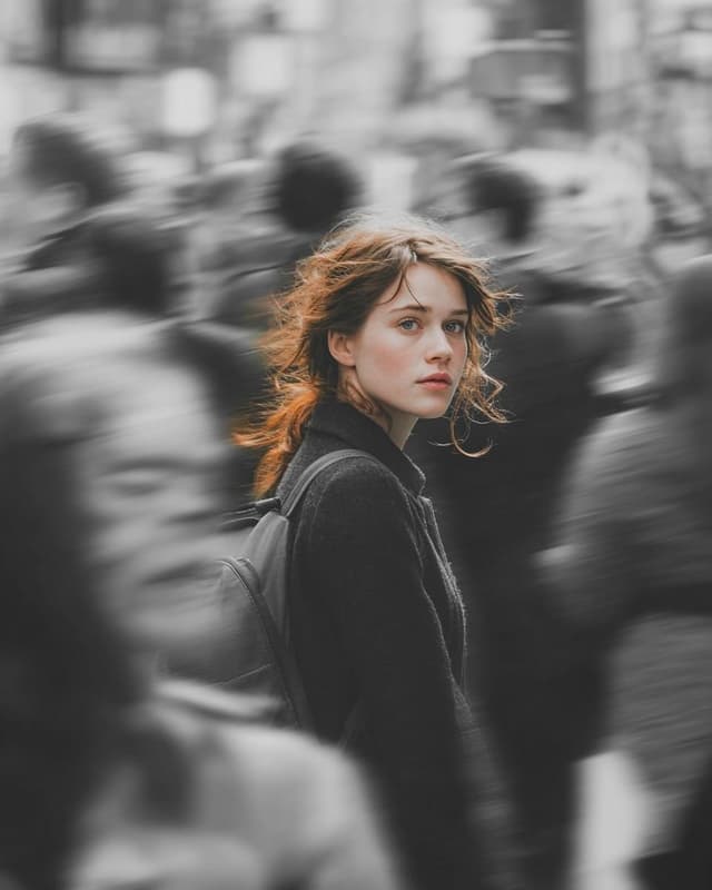 GPT Image Prompt - A cinematic street portrait of a young woman walking through