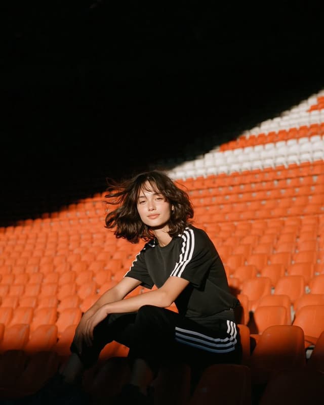 Midjourney Prompt - Photorealistic cinematic sports editorial inside a large foo