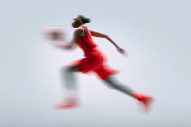 Other Prompt - A blurred silhouette of a [subject] in motion, wearing a [co